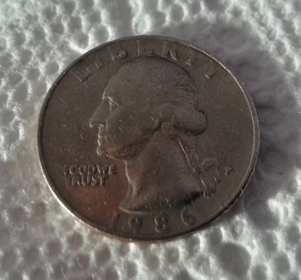 Extreme-Rim-Wear-On-A-Washington-Quarter